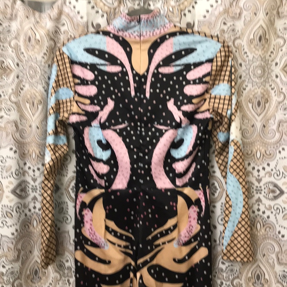 A very beautiful one piece brand Never wore